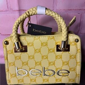 bebe Yellow Patterned Satchel with Braided Handles and Silver Logo